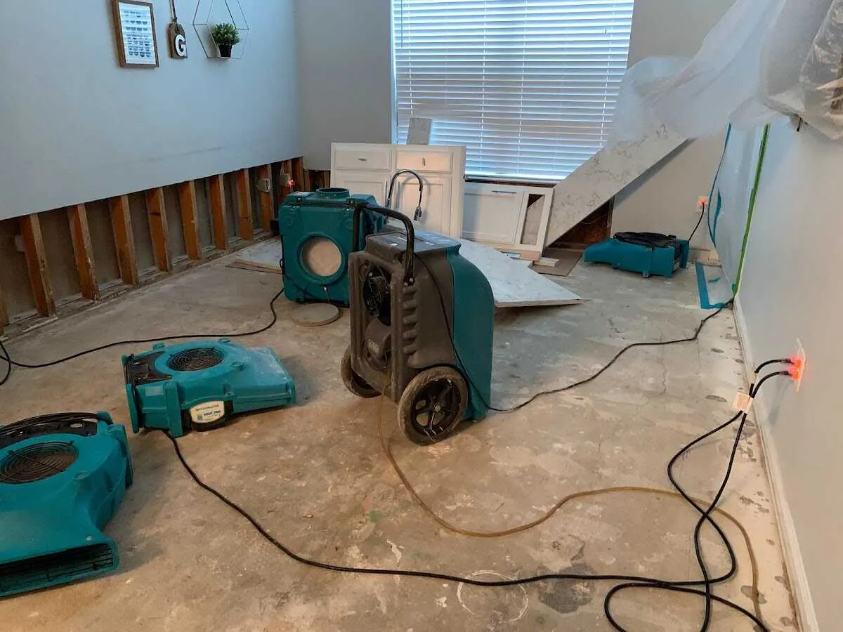 Dehumidifier in flood-cut room for Water Damage Restoration in Hampton